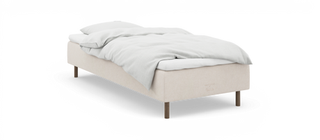 Beige enkel säng med vit bäddning och träben, nocturne by TEMPUR.