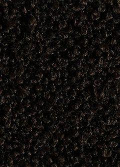 Närbild av mörkbrun, tät textur av heltäckningsmatta.