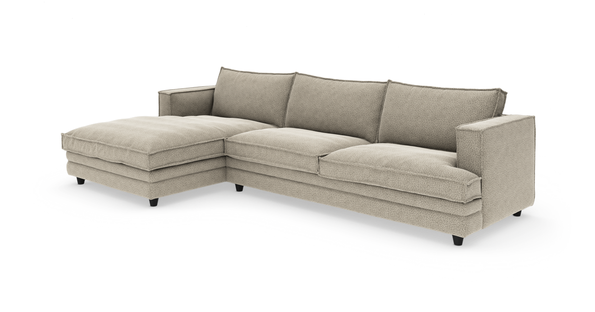 L‑formad beige modulsoffa med vänster divan, frilagd mot vit bakgrund.