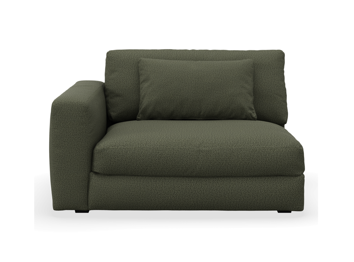 Mörkgrön modulsoffa med vänster armstöd och kudde, frontvy.