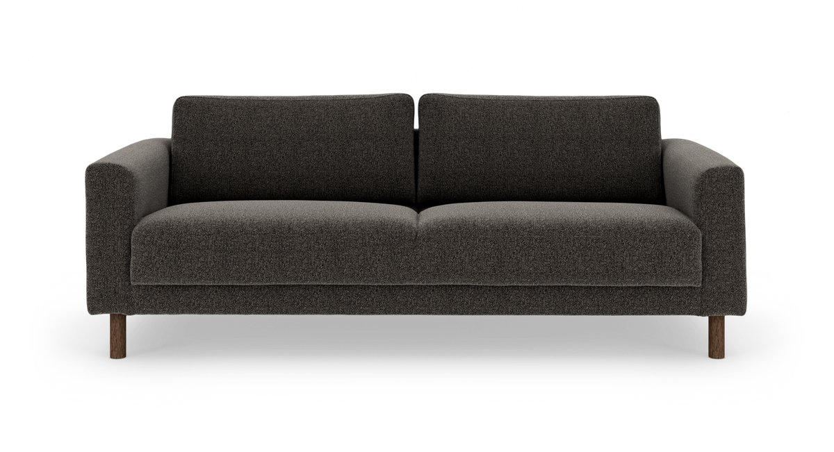 Mörkgrå 3-sits soffa med träben, frilagd mot vit bakgrund.
