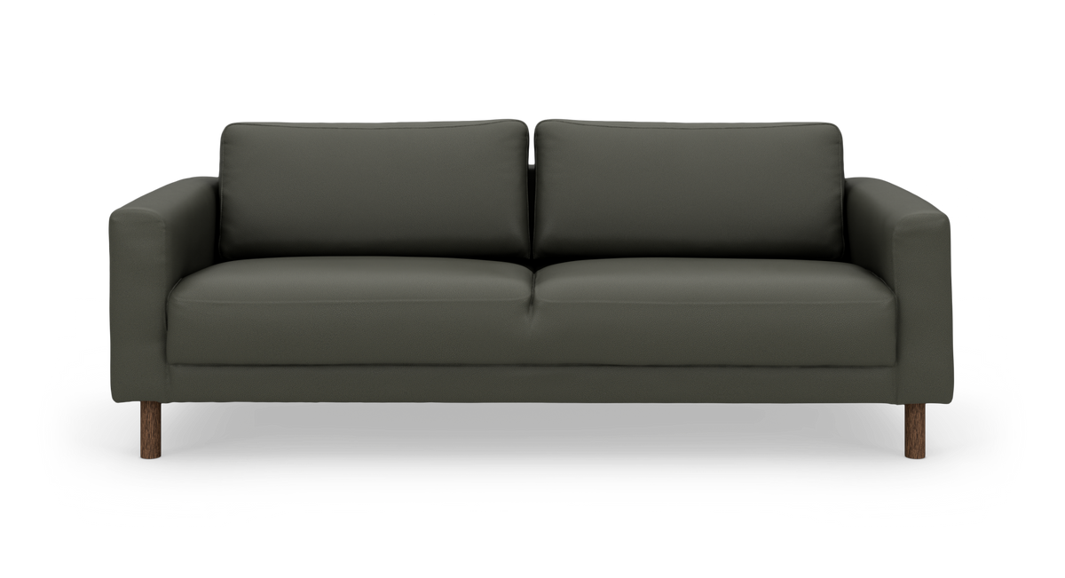 Mörkgrön 3-sits soffa med raka armstöd och träben, frilagd mot vit bakgrund.