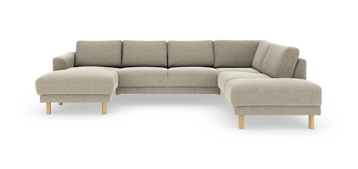 Beige U‑formad modulsoffa med schäslong till vänster och avslutande divan till höger, runda träben.