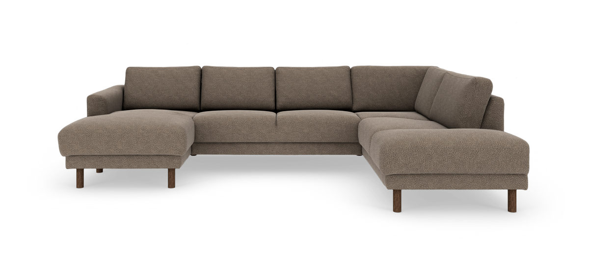 L‑formad modulsoffa med vänster schäslong och höger divan, klädd i brun/beige bouclé och med runda mörkbruna träben.