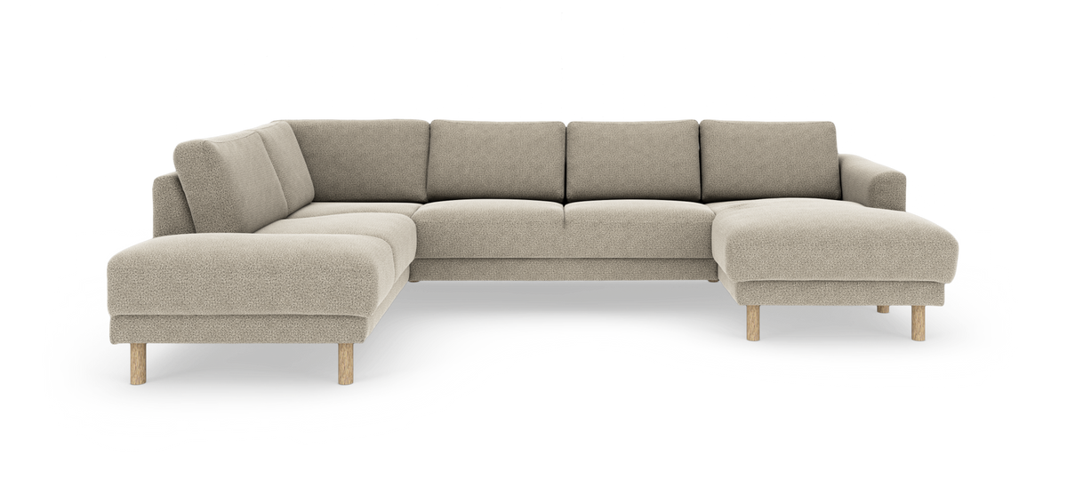 L-formad beige hörnsoffa med träben i modern, mjuk design.