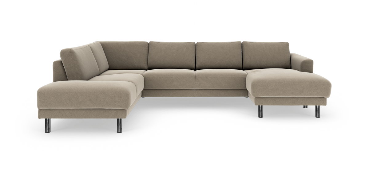 U-formad beige modulsoffa med schäslonger på båda sidor och kromade ben, frilagd mot vit bakgrund.