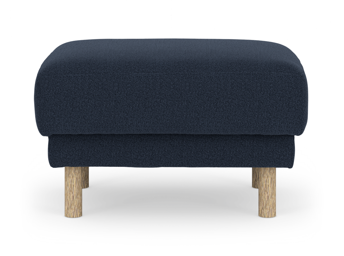 Mörkblå ottoman/sittpuff med runda träben, frontvy.