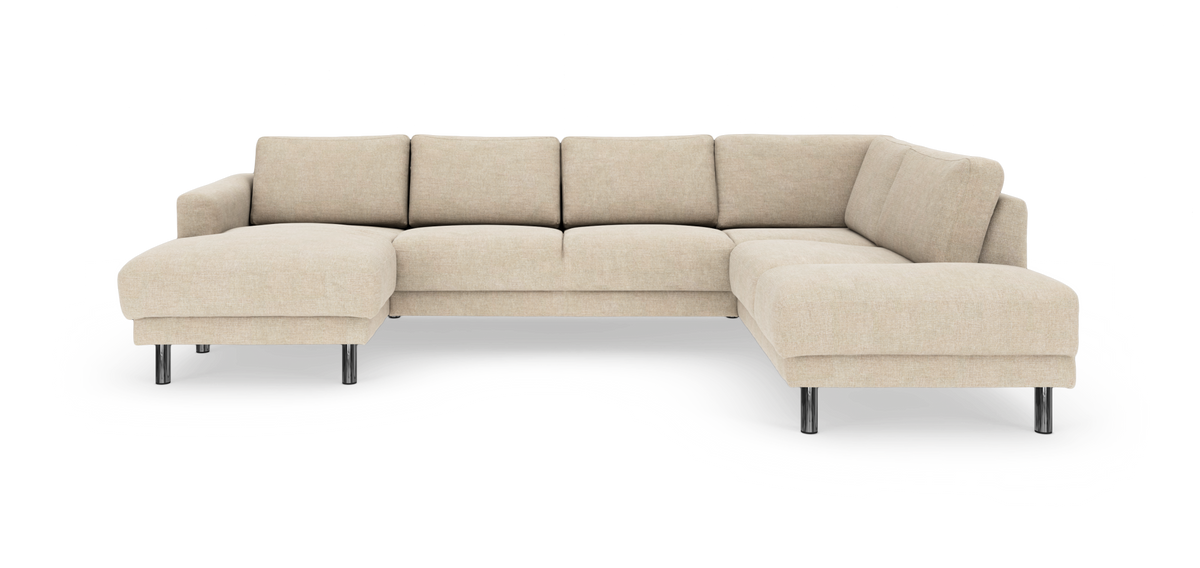 Beige L‑formad modulsoffa med schäslong till vänster och metallben, frilagd på vit bakgrund.