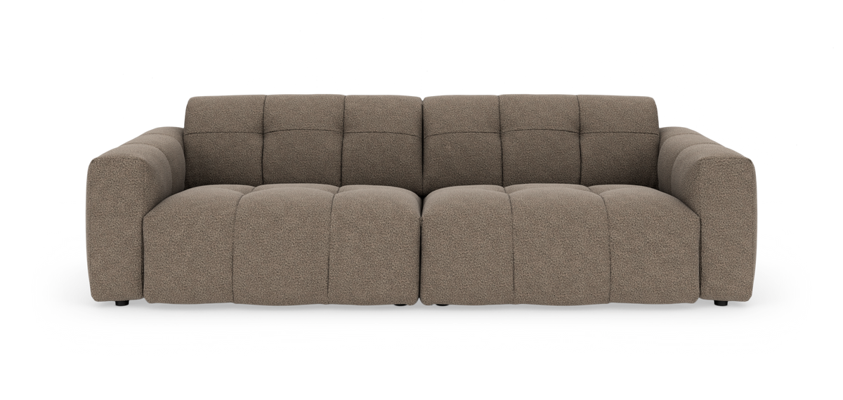 Brun-beige modulsoffa med rundade former i bouclétyg, frilagd mot vit bakgrund.