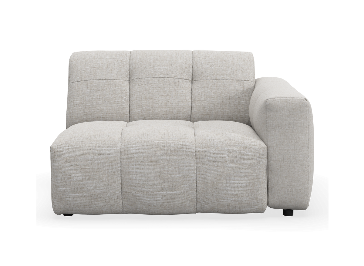 Modulsoffa med höger armstöd i ljus beige textil, sedd rakt framifrån.