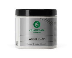Guardian Furniture Care Wood Soap – vitpigmenterad träsåpa i burk med svart lock.