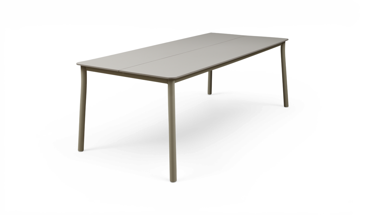 Rektangulärt beige matbord med rundade hörn och smala ben, frilagt på vit bakgrund.
