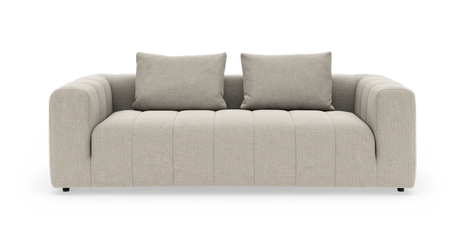 Beige soffa med två ryggkuddar, frilagd på vit bakgrund.