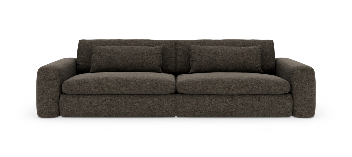 Mörkgrå tvåsits soffa med runda armstöd och två avlånga ryggkuddar, frilagd på vit bakgrund.