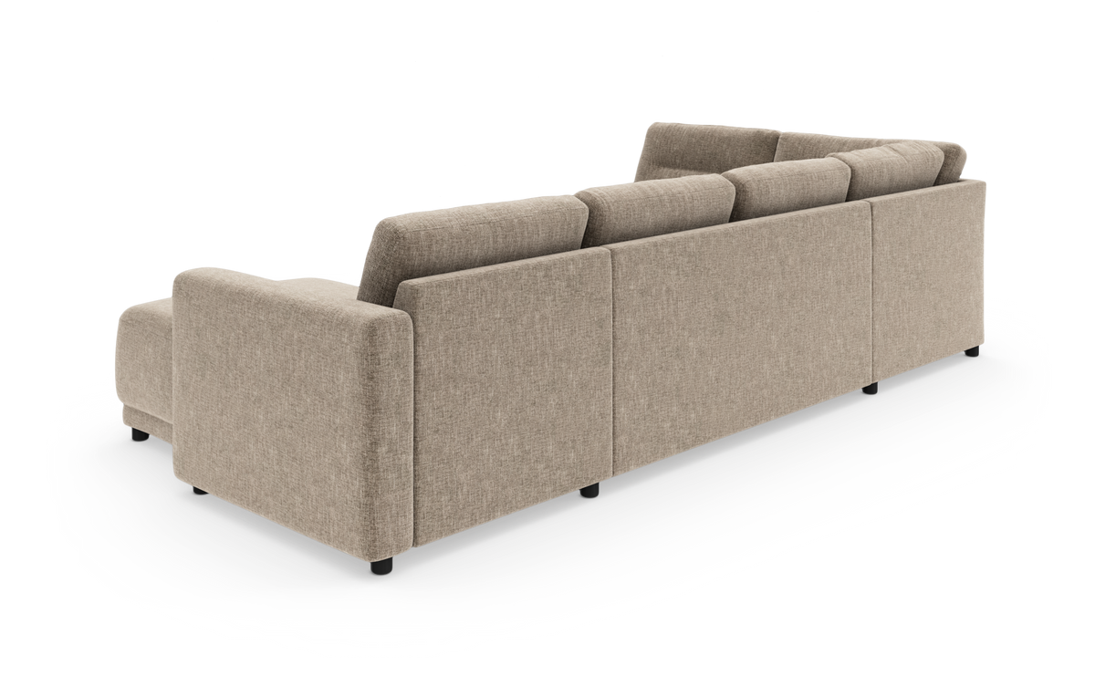 Beige modulsoffa sedd bakifrån i vinkel på vit bakgrund.