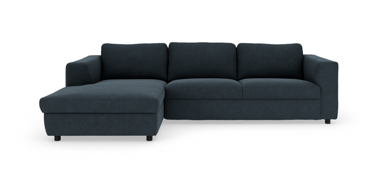Mörkblå modulsoffa/hörnsoffa med vänsterställd chäslong, modern och frilagd på vit bakgrund.