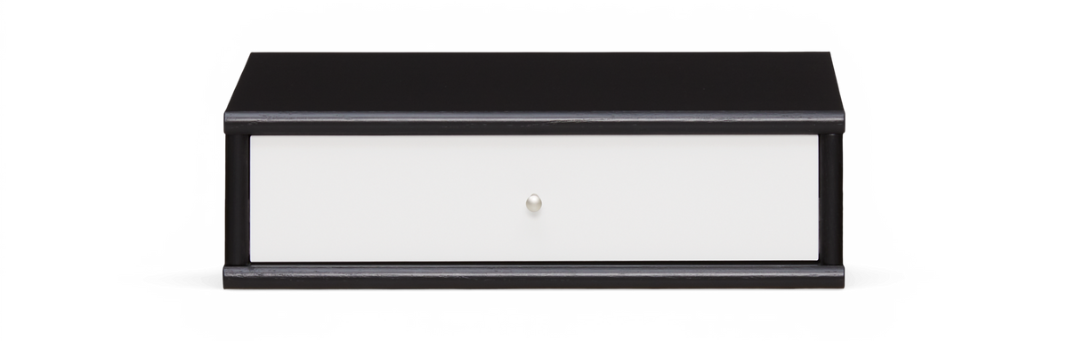 Svart skuffemodul med vit front och rund knop, frilagd i frontvy.