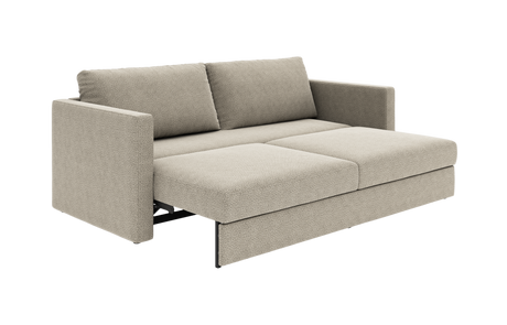 Beige bäddsoffa i tyg, utdragen till säng i 3/4‑vy mot vit bakgrund.