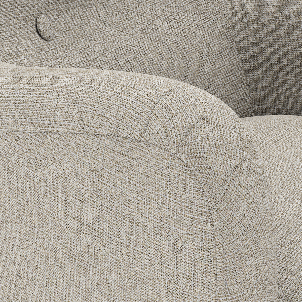 Närbild på beige textilklädsel och rundat armstöd på soffa med knapp i ryggstödet.