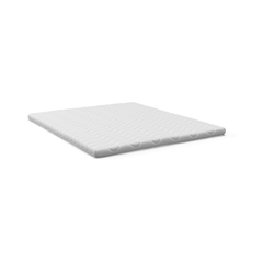 Vit bäddmadrass/topper med vågig quiltning på vit bakgrund.