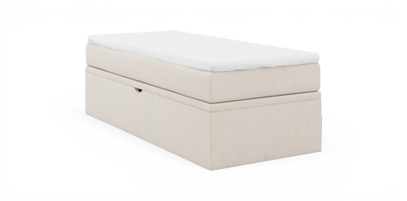 Beige sängmodul med vit bäddmadrass på vit bakgrund.
