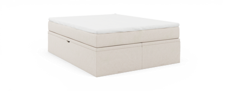 Beige klädd sängbotten med vit bäddmadrass, märkt nocturne.