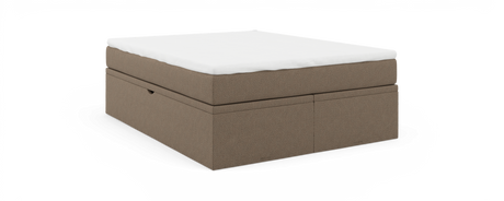 Beige klädd förvaringssäng med vit bäddmadrass mot svart bakgrund.
