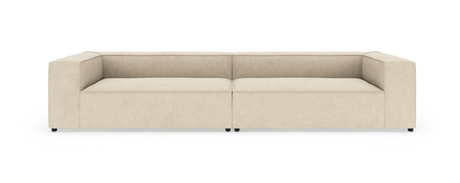 Beige modern modulsoffa med låg rygg, sedd rakt fram mot vit bakgrund.