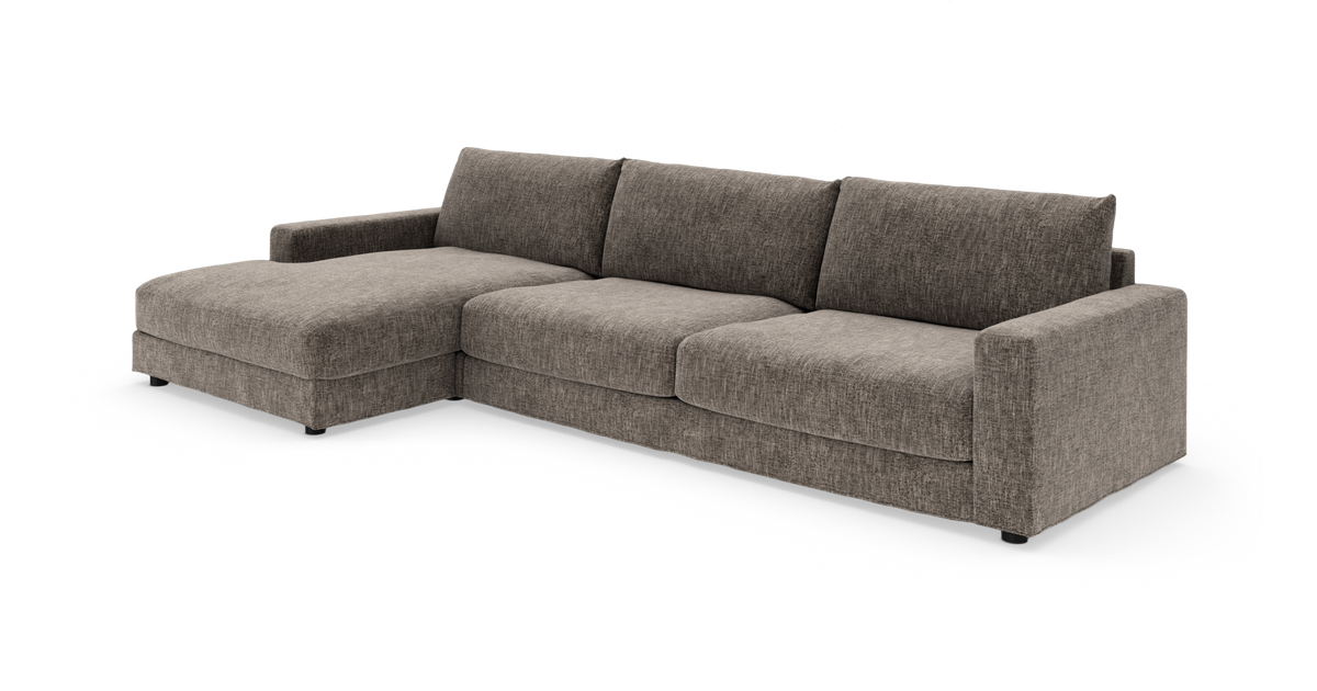 Grå L‑formad soffa med vänster divan, isolerad mot vit bakgrund.