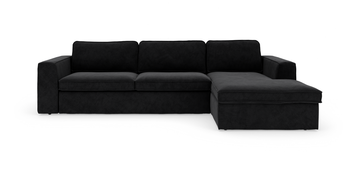 Svart modulsoffa med högerställd schäslong, frontvy, fristående mot vit bakgrund.