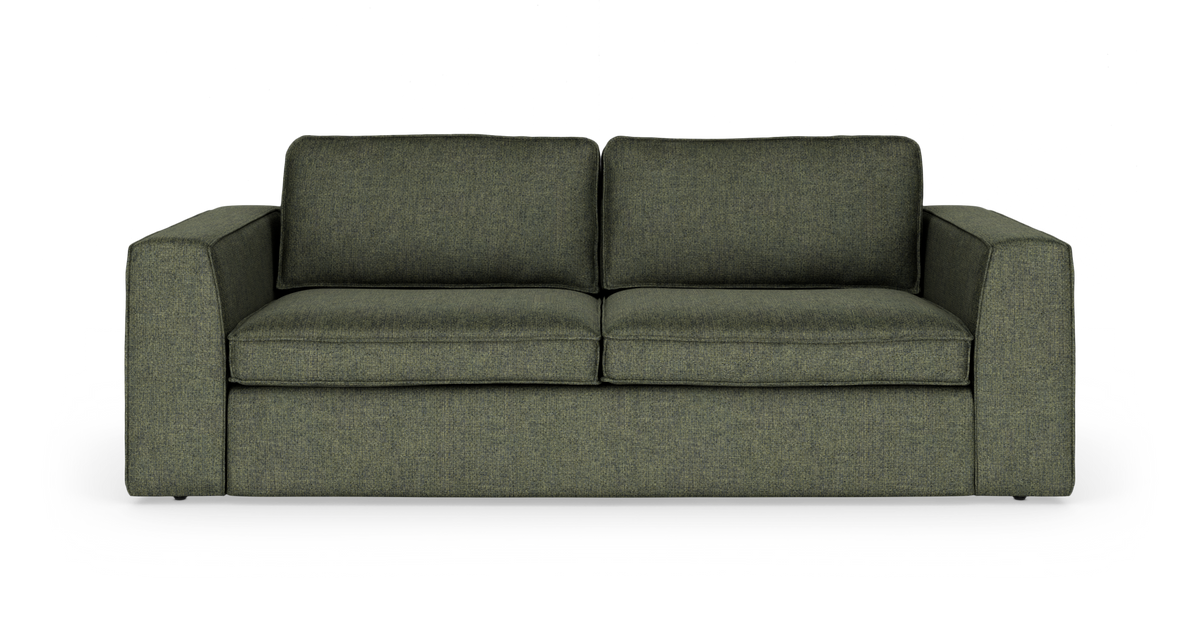 Grön 3‑sits soffa med breda armstöd, frilagd på vit bakgrund.