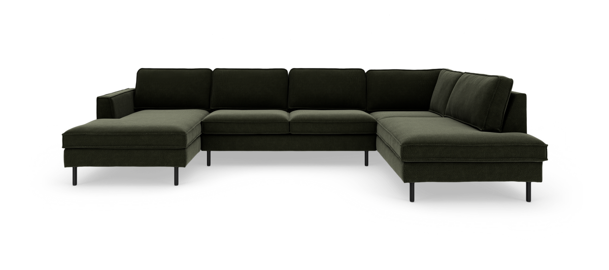 Mörkgrön U-formad modulsoffa med schäslong på båda sidor och smala svarta ben, frilagd på vit bakgrund.