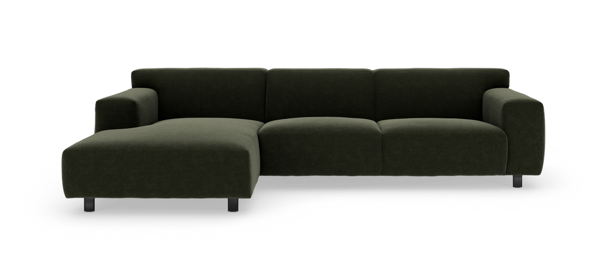 Mörkgrön modulsoffa med vänster divan, isolerad mot vit bakgrund.