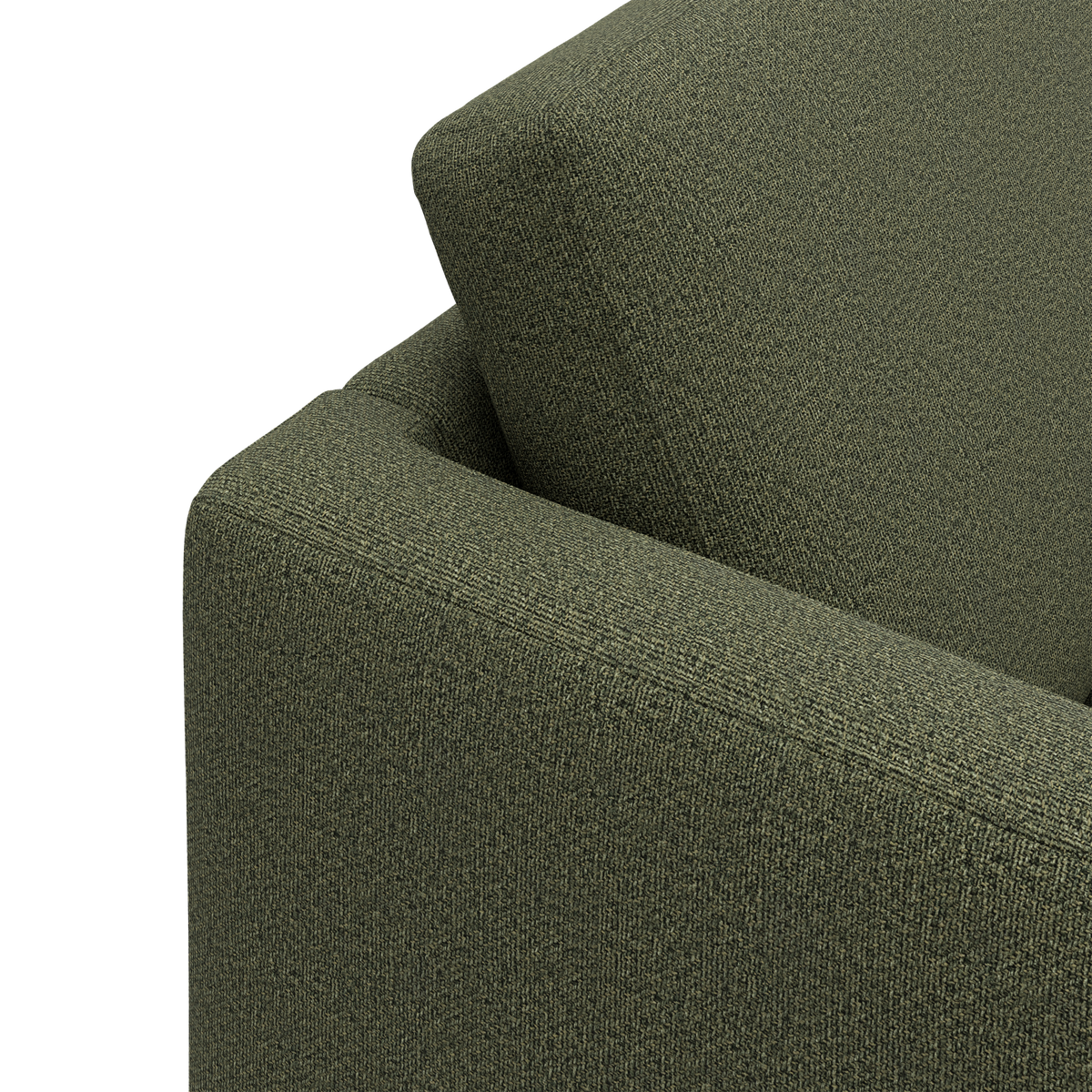 Närbild av en grön, texturerad tygsoffas hörn med armstöd och ryggkudde.