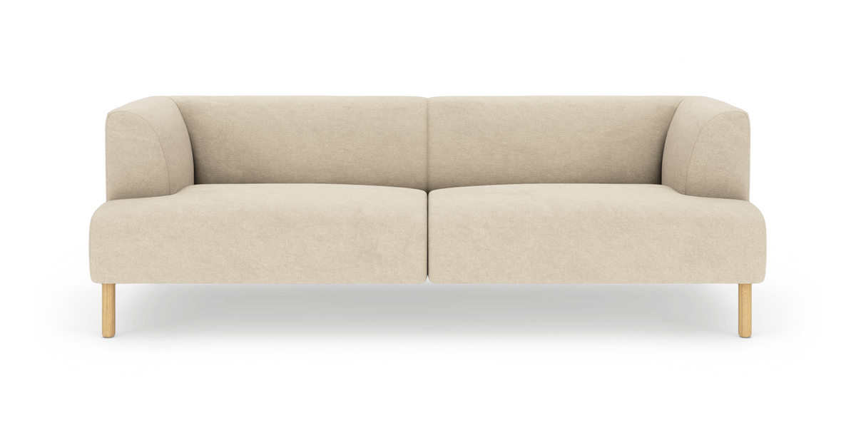 Beige tvåsitsig soffa med rundade kanter och träben, frilagd på vit bakgrund.