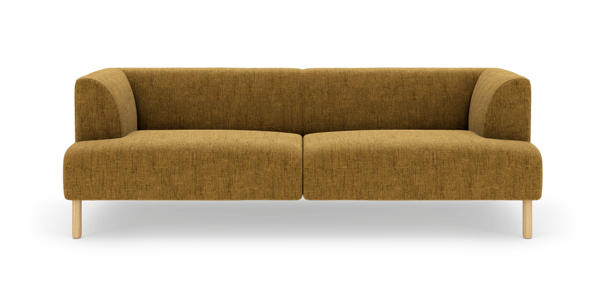 Modern senapsgul 3‑sits soffa med rundade hörn och ljusa träben, frilagd mot vit bakgrund.