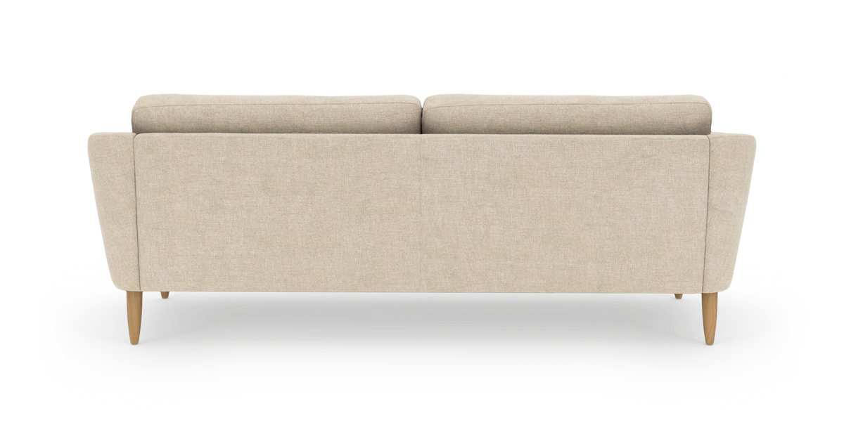 Beige 3-sitssoffa sedd bakifrån med runda träben, frilagd på vit bakgrund.
