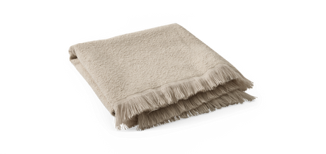 Beige pläd med fransar, vikt.
