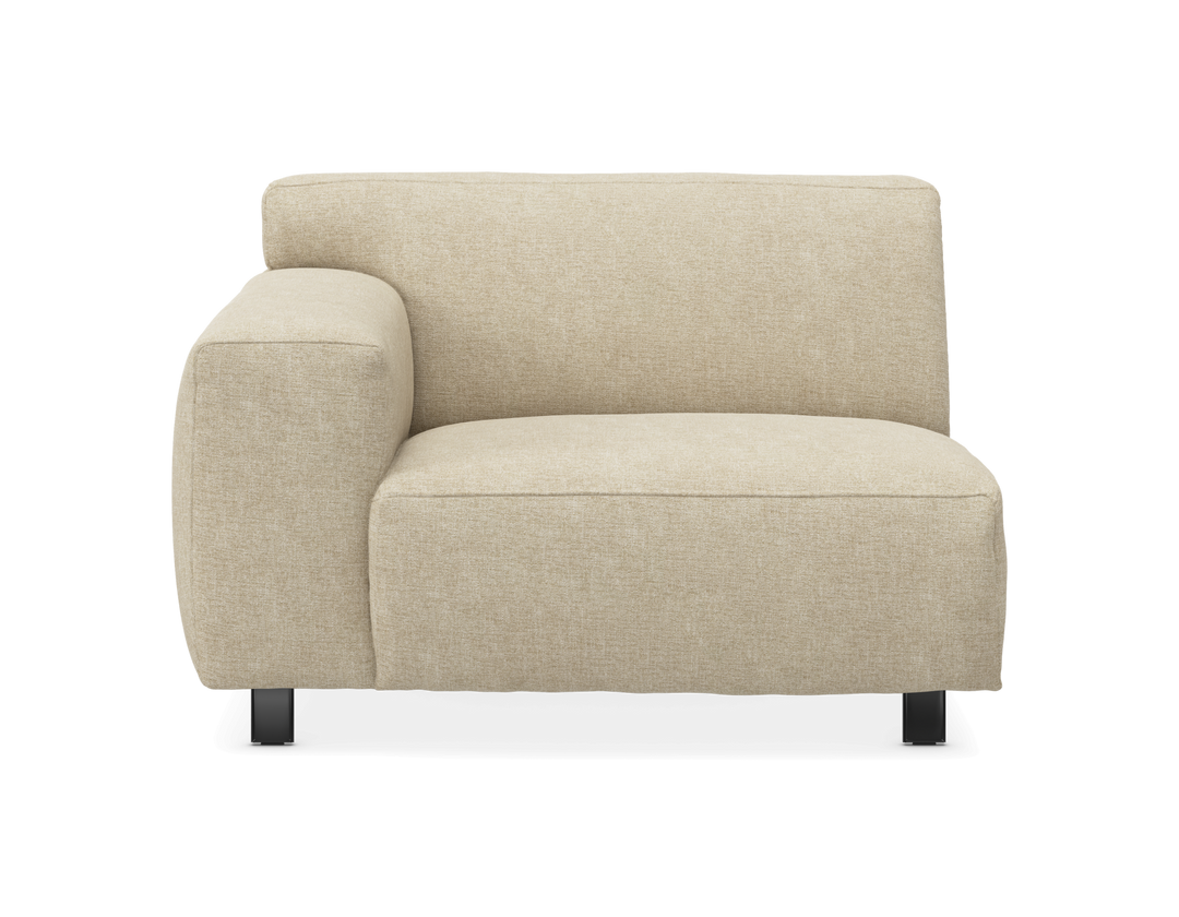 Beige modulsoffa, hörnsektion med vänster armstöd på svarta ben, frontvy.