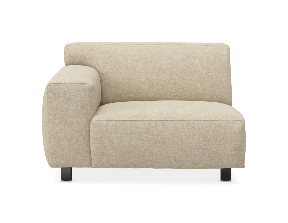 Beige modulsoffa, hörnsektion med vänster armstöd på svarta ben, frontvy.