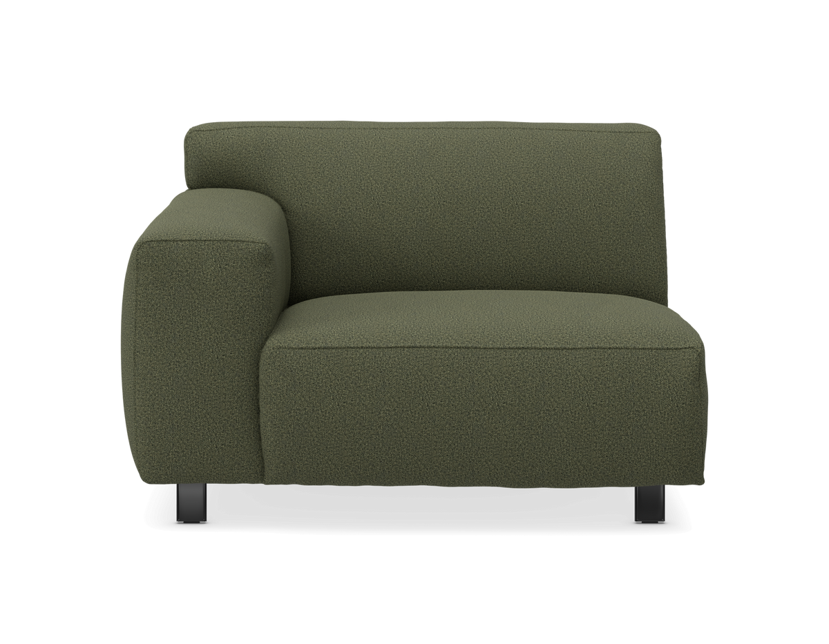Grön modulsofa-sektion med vänster armstöd, frilagd produktbild sedd framifrån.