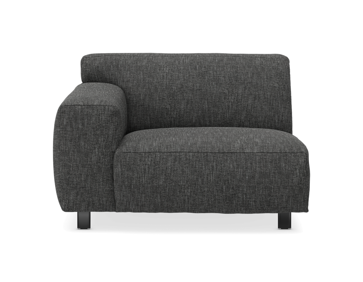 Mörkgrå modulsofa/sofamodul med vänster armstöd, frontvy på vit bakgrund.
