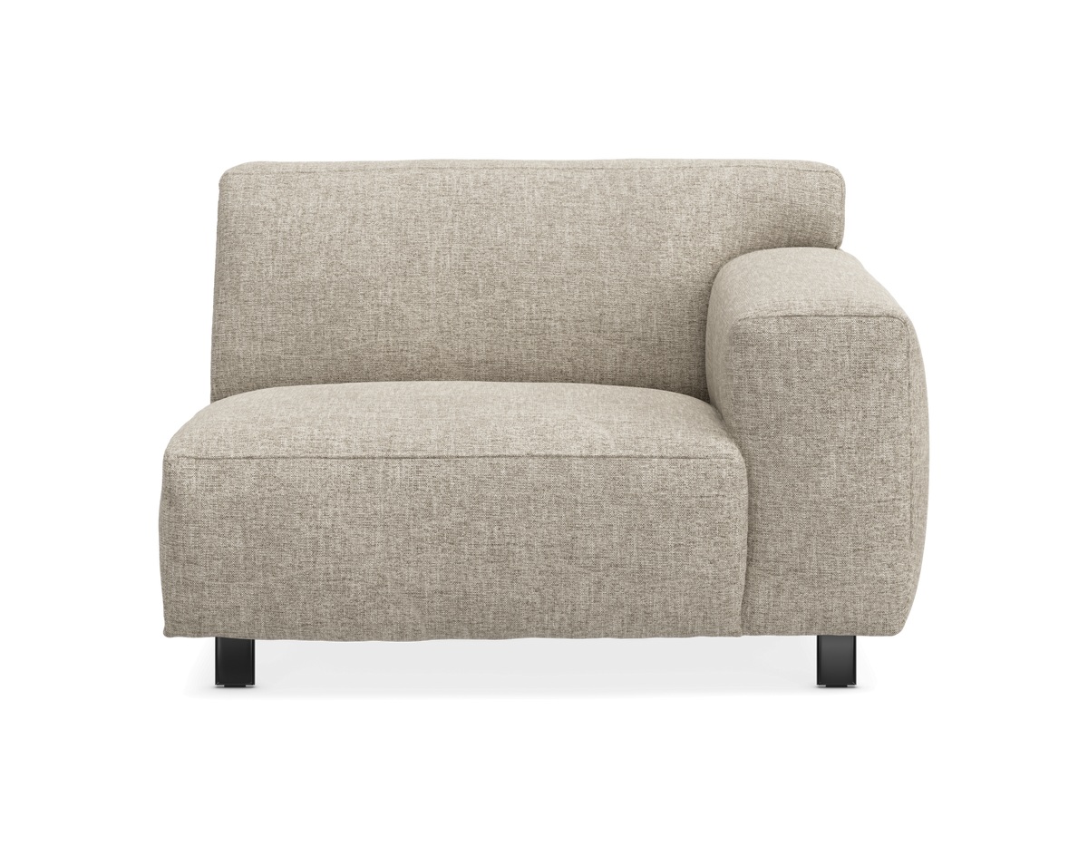 Modulsoffa med höger arm i beige tyg, frontvy mot vit bakgrund.