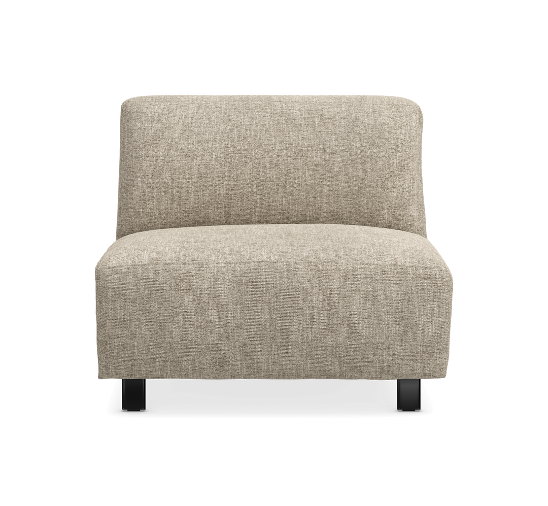 Beigefärgad armlös loungestol/modul i textil, sedd rakt framifrån mot vit bakgrund.