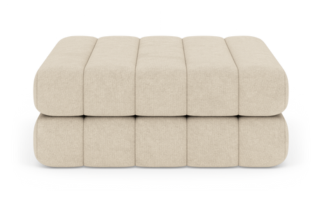 Beige modulär ottoman/pall i två lager, fotograferad framifrån i studio.