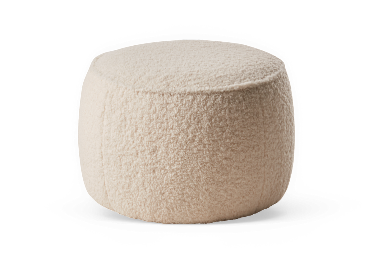 Beige rund bouclé‑puff/ottoman för sittplats eller fotpall.