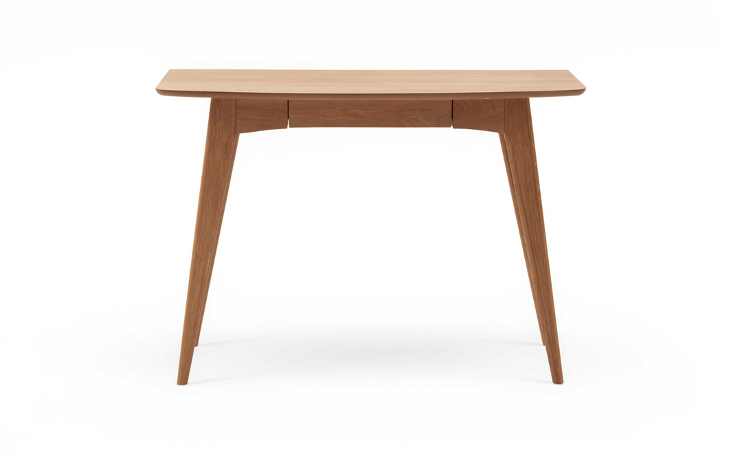 Konsolbord/skrivbord i ek med smal låda och avsmalnande ben, frilagt mot vit bakgrund.