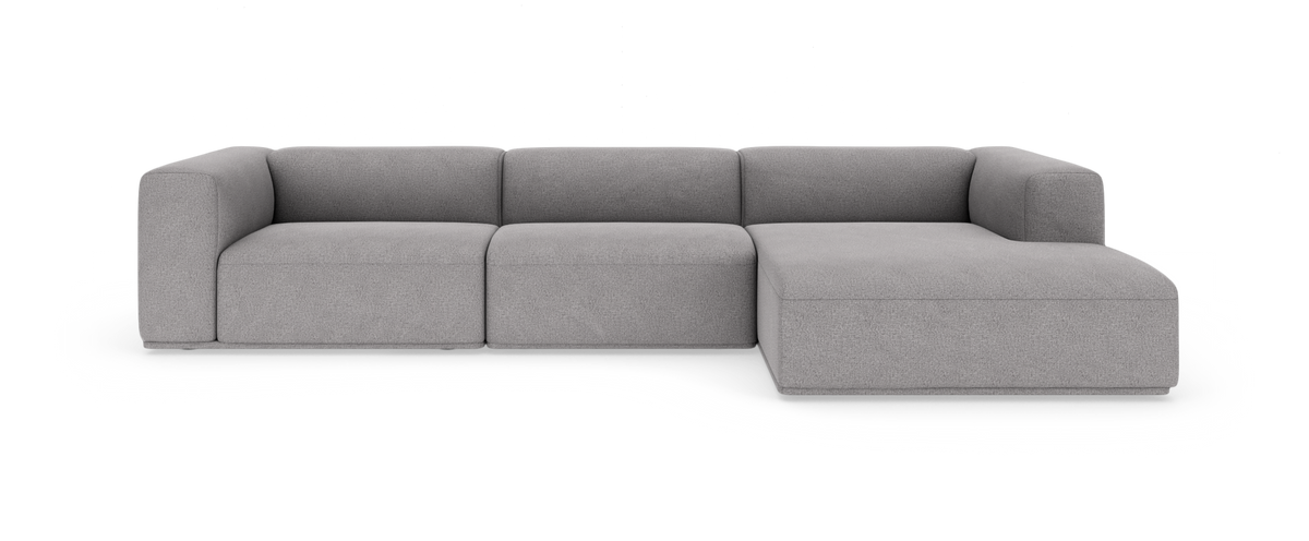 Grå modulsoffa med divan till höger, frilagd på vit bakgrund.
